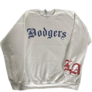 Brand new Large sweater. Available in XL